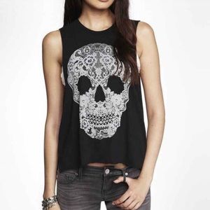 Skull shirt w/ black lace back. Never been worn.